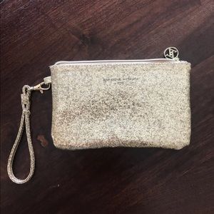 Adrienne Vittadini gold clutch / wristlet